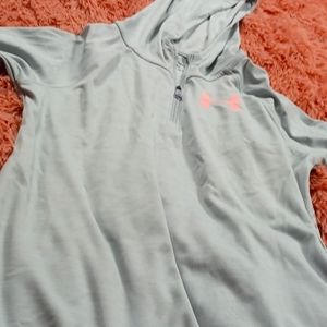 A long-sleeve light gray Under Armour pullover